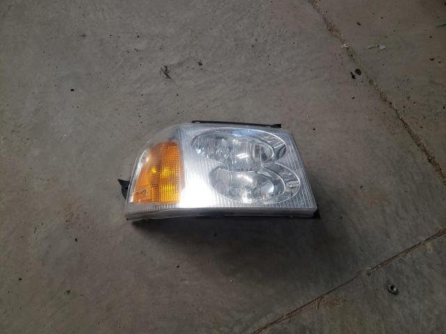 1GKDT13S042436891 - 2004 GMC ENVOY SILVER photo 13