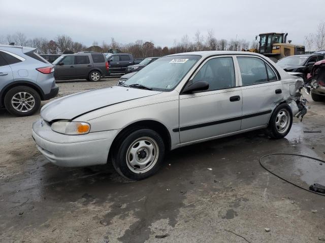 1Y1SK5286YZ425843 - 2000 CHEVROLET GEO PRIZM BASE SILVER photo 1