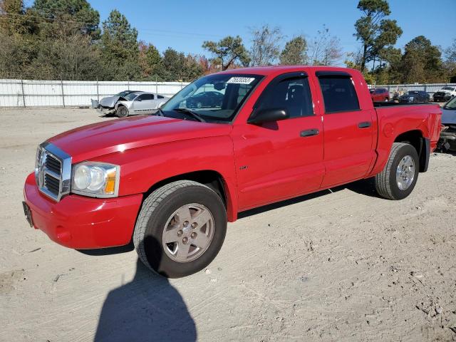 1D7HW58N95S195015 - 2005 DODGE DAKOTA QUAD LARAMIE RED photo 1