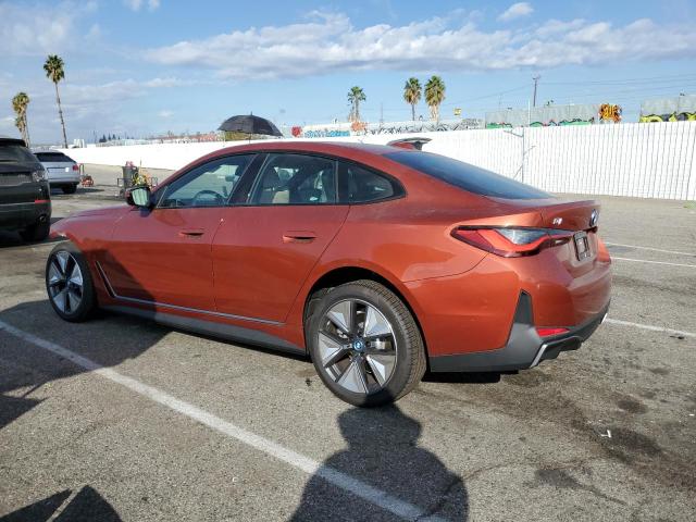 WBY43AW04PFP72058 - 2023 BMW I4 EDRIVE3 ORANGE photo 2