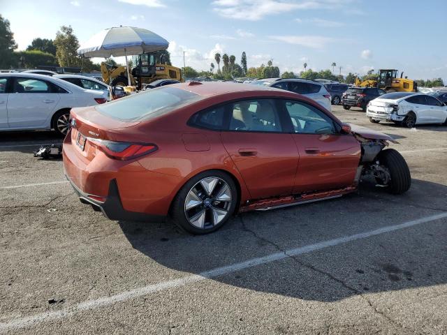 WBY43AW04PFP72058 - 2023 BMW I4 EDRIVE3 ORANGE photo 3
