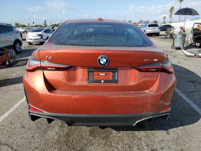 WBY43AW04PFP72058 - 2023 BMW I4 EDRIVE3 ORANGE photo 6