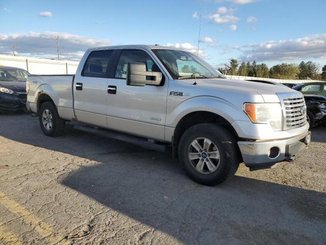 1FTFW1ET7EFA79964 - 2014 FORD F150 SUPERCREW SILVER photo 4