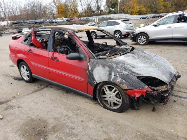 1FAFP343XYW287082 - 2000 FORD FOCUS SE RED photo 4