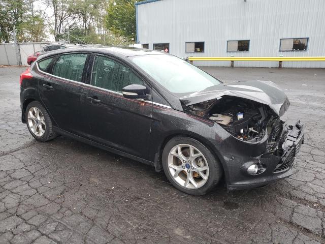 1FAHP3M27CL468828 - 2012 FORD FOCUS SEL BLACK photo 4