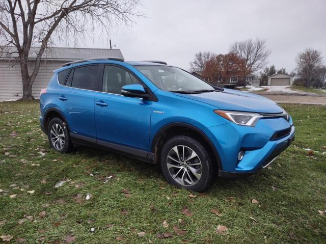 JTMRJREVXHD142289 - 2017 TOYOTA RAV4 HV LE BLUE photo 1