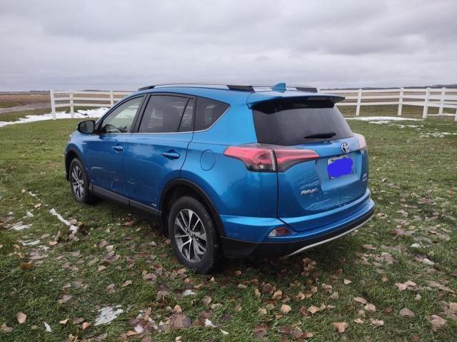 JTMRJREVXHD142289 - 2017 TOYOTA RAV4 HV LE BLUE photo 3