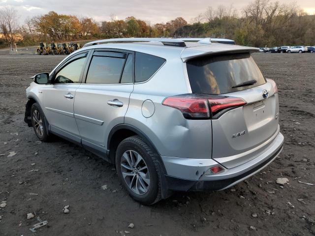 JTMRJREV9GD011675 - 2016 TOYOTA RAV4 HV XLE SILVER photo 2