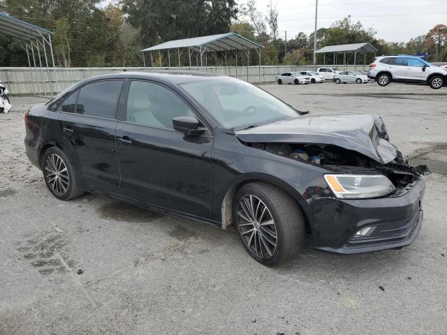 3VWD17AJ5FM348216 - 2015 VOLKSWAGEN JETTA SE BLACK photo 4