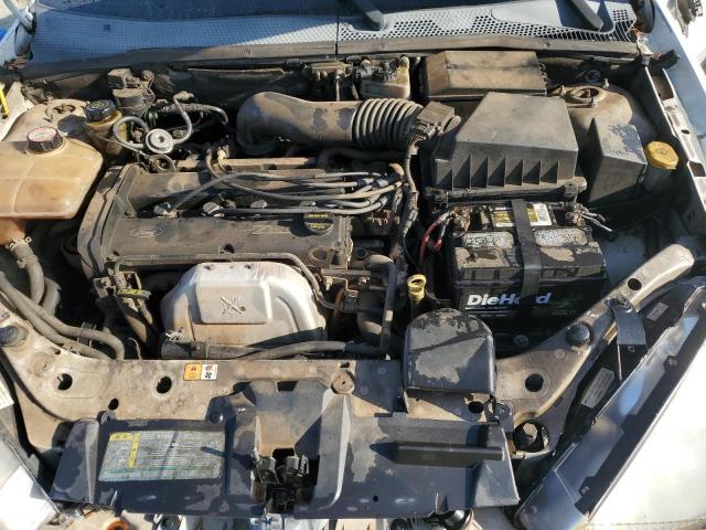 1FAFP34302W246077 - 2002 FORD FOCUS SE WHITE photo 11