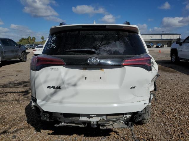 JTMNFREV4JJ191611 - 2018 TOYOTA RAV4 SE WHITE photo 6