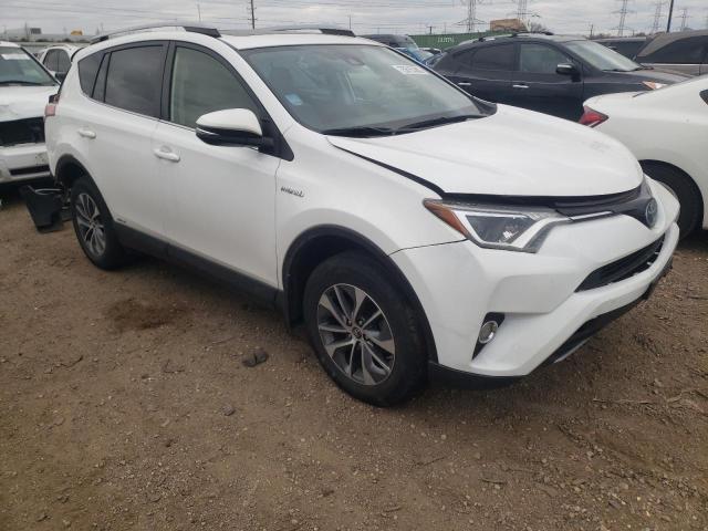 JTMRJREVXJD181678 - 2018 TOYOTA RAV4 HV LE WHITE photo 4