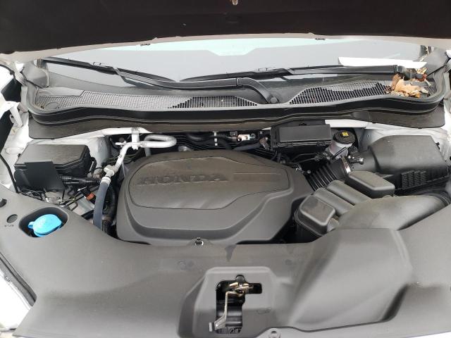 5FNYF8H53PB014518 - 2023 HONDA PASSPORT EXL WHITE photo 11