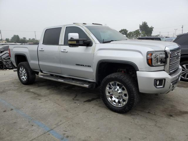 1GT12SEY2KF206297 - 2019 GMC SIERRA K2500 DENALI SILVER photo 4