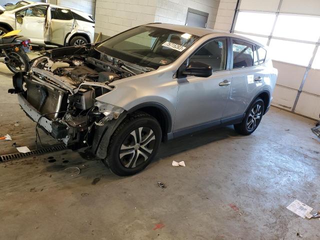 JTMBFREV0JJ228768 - 2018 TOYOTA RAV4 LE SILVER photo 1