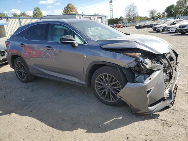 2T2BZMCA2KC200554 - 2019 LEXUS RX 350 BASE GRAY photo 4