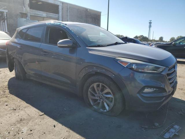 KM8J3CA27GU022461 - 2016 HYUNDAI TUCSON LIMITED GRAY photo 4