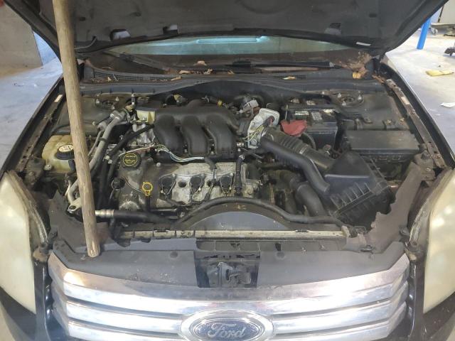 3FAHP08118R187732 - 2008 FORD FUSION SEL BLACK photo 11