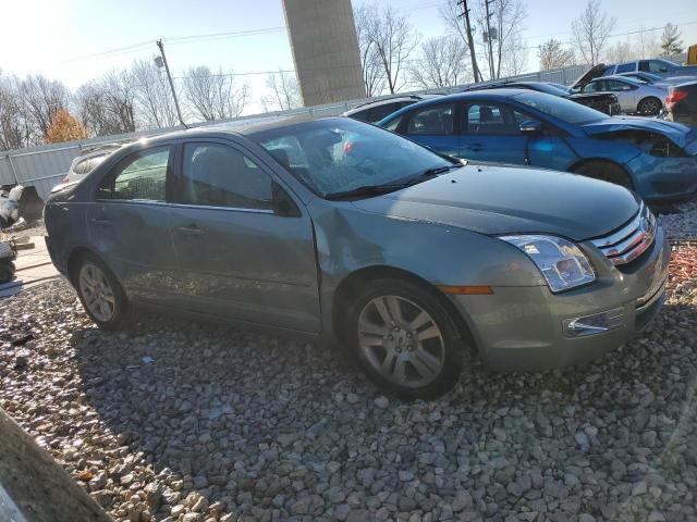 3FAHP08109R162631 - 2009 FORD FUSION SEL TURQUOISE photo 4