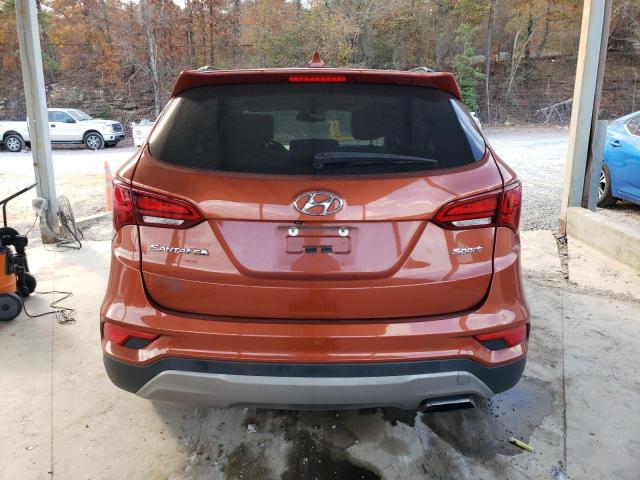 5XYZU3LB0HG425587 - 2017 HYUNDAI SANTA FE S ORANGE photo 6