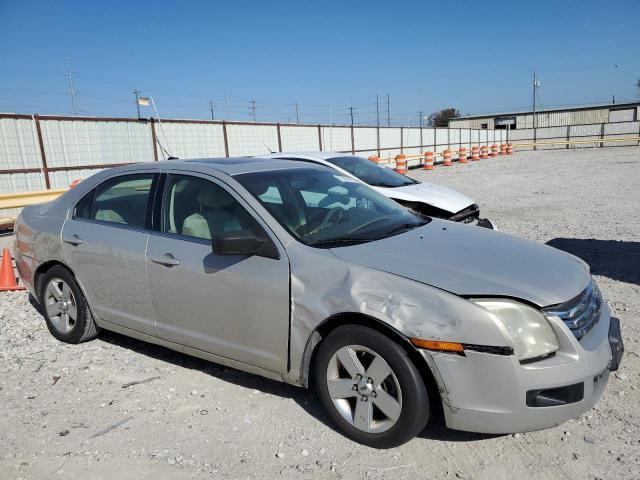 3FAHP07Z69R120827 - 2009 FORD FUSION SE TAN photo 4