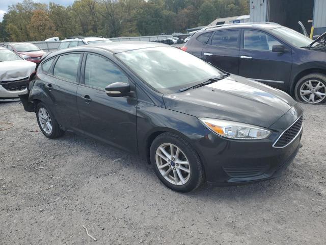 1FADP3K28FL365682 - 2015 FORD FOCUS SE BLACK photo 4