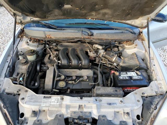 1FAFP58S7YG202772 - 2000 FORD TAURUS SE SILVER photo 11