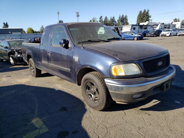 2FTRX17W03CA66709 - 2003 FORD F150 BLUE photo 4