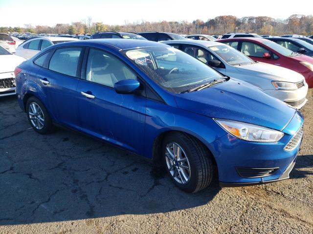 1FADP3F20JL207193 - 2018 FORD FOCUS SE BLUE photo 4