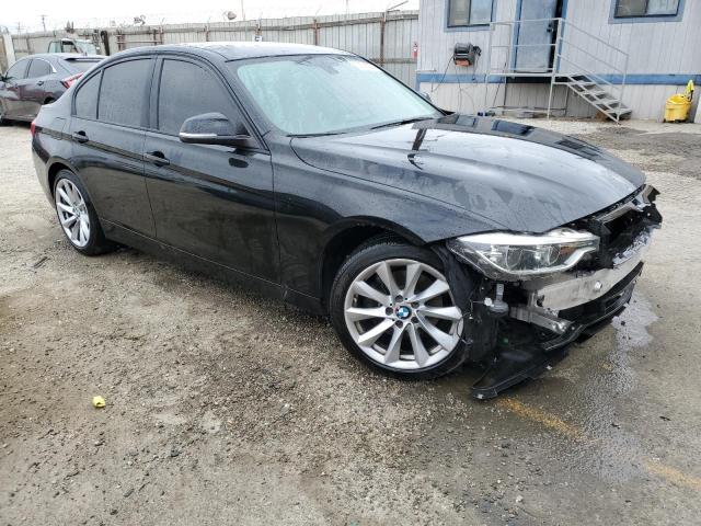 WBA8A9C55JAH12804 - 2018 BMW 320 I BLACK photo 4