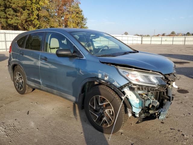 2HKRM3H43GH549001 - 2016 HONDA CR-V SE BLUE photo 4