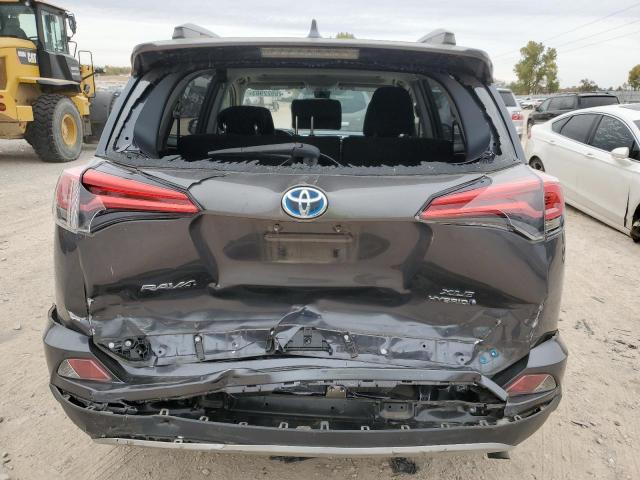 JTMRJREV5JD196041 - 2018 TOYOTA RAV4 HV LE CHARCOAL photo 6