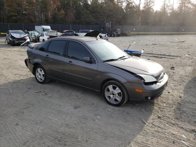 1FAHP38Z65W196894 - 2005 FORD FOCUS ZX4 ST GRAY photo 4