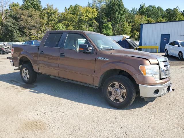 1FTEW1CM3BKD28318 - 2011 FORD F150 SUPERCREW BROWN photo 4