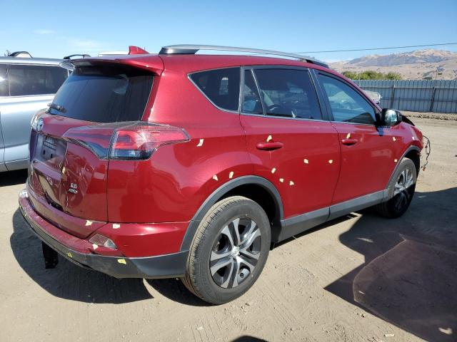 2T3BFREV6JW829569 - 2018 TOYOTA RAV4 LE RED photo 3