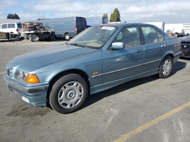 WBACC9322WEE60455 - 1998 BMW 318I I TURQUOISE photo 1