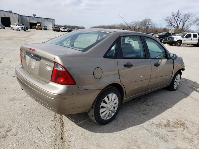 1FAFP34N05W159981 - 2005 FORD FOCUS ZX4 TAN photo 3