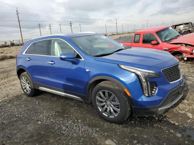 1GYFZDR42MF005324 - 2021 CADILLAC XT4 PREMIUM LUXURY BLUE photo 4