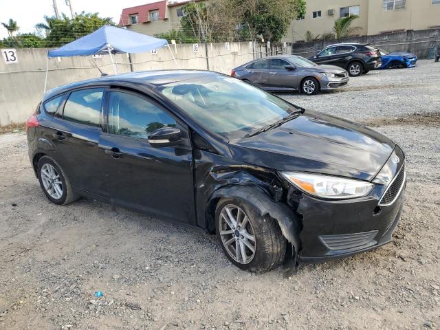 1FADP3K2XHL312470 - 2017 FORD FOCUS SE BLACK photo 4