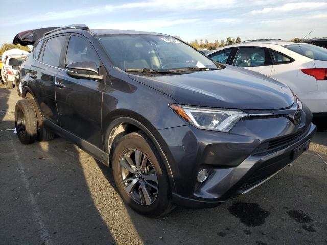 JTMWFREV3HJ719010 - 2017 TOYOTA RAV4 XLE GRAY photo 4