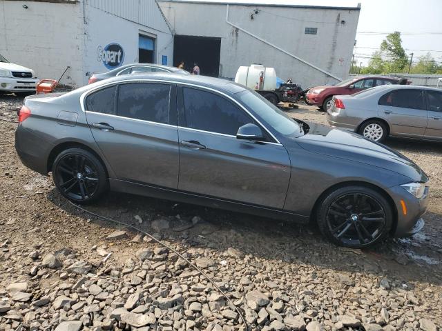 WBA8D9C5XJEM32499 - 2018 BMW 330 XI GRAY photo 4