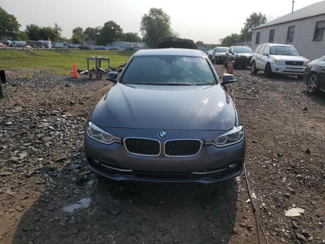 WBA8D9C5XJEM32499 - 2018 BMW 330 XI GRAY photo 5