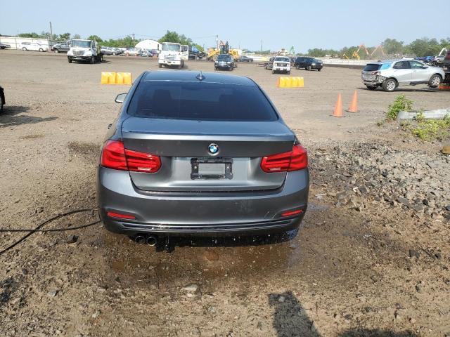 WBA8D9C5XJEM32499 - 2018 BMW 330 XI GRAY photo 6