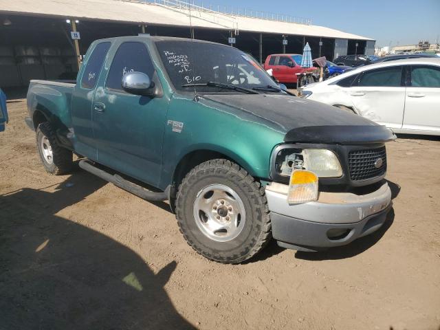 1FTRX07L5XKC21921 - 1999 FORD F150 GREEN photo 4