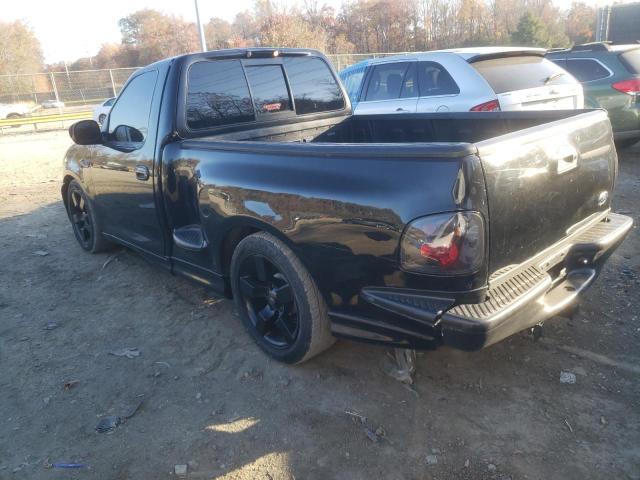 2FTRF07314CA58915 - 2004 FORD F150 SVT LIGHTNING BLACK photo 2