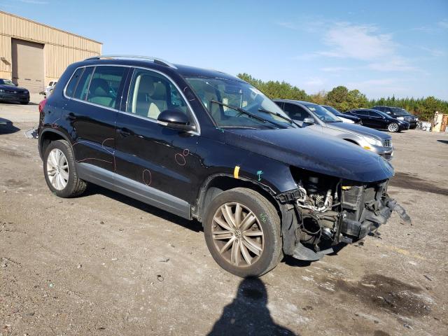 WVGAV7AX0CW512140 - 2012 VOLKSWAGEN TIGUAN S BLACK photo 4