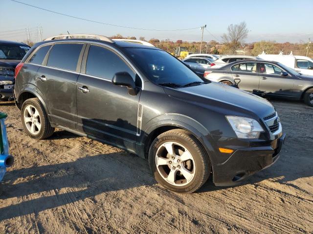 3GNAL4EK3ES579781 - 2014 CHEVROLET CAPTIVA LTZ BLACK photo 4