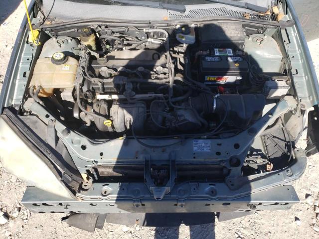 1FAFP34N85W224124 - 2005 FORD FOCUS ZX4 GREEN photo 11