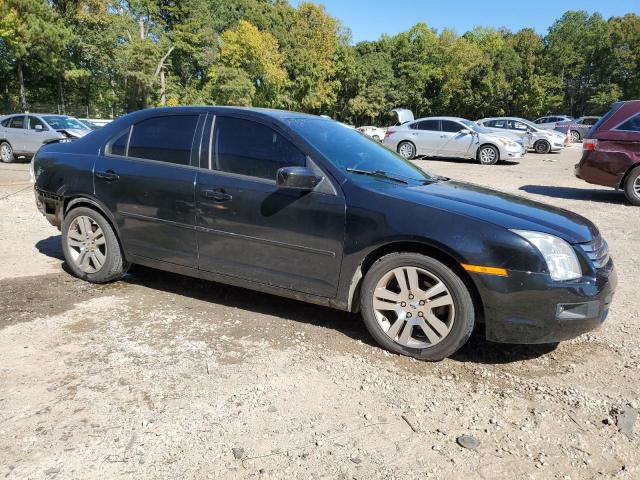 3FAHP07Z37R190167 - 2007 FORD FUSION SE BLACK photo 4