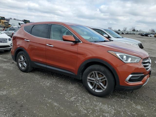 5XYZT3LB9HG419175 - 2017 HYUNDAI SANTA FE S ORANGE photo 4